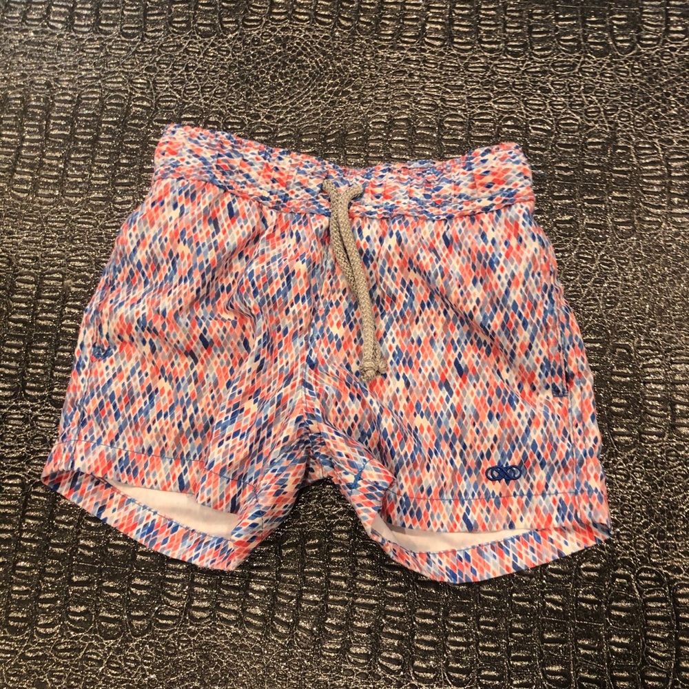 Le club swim trunks